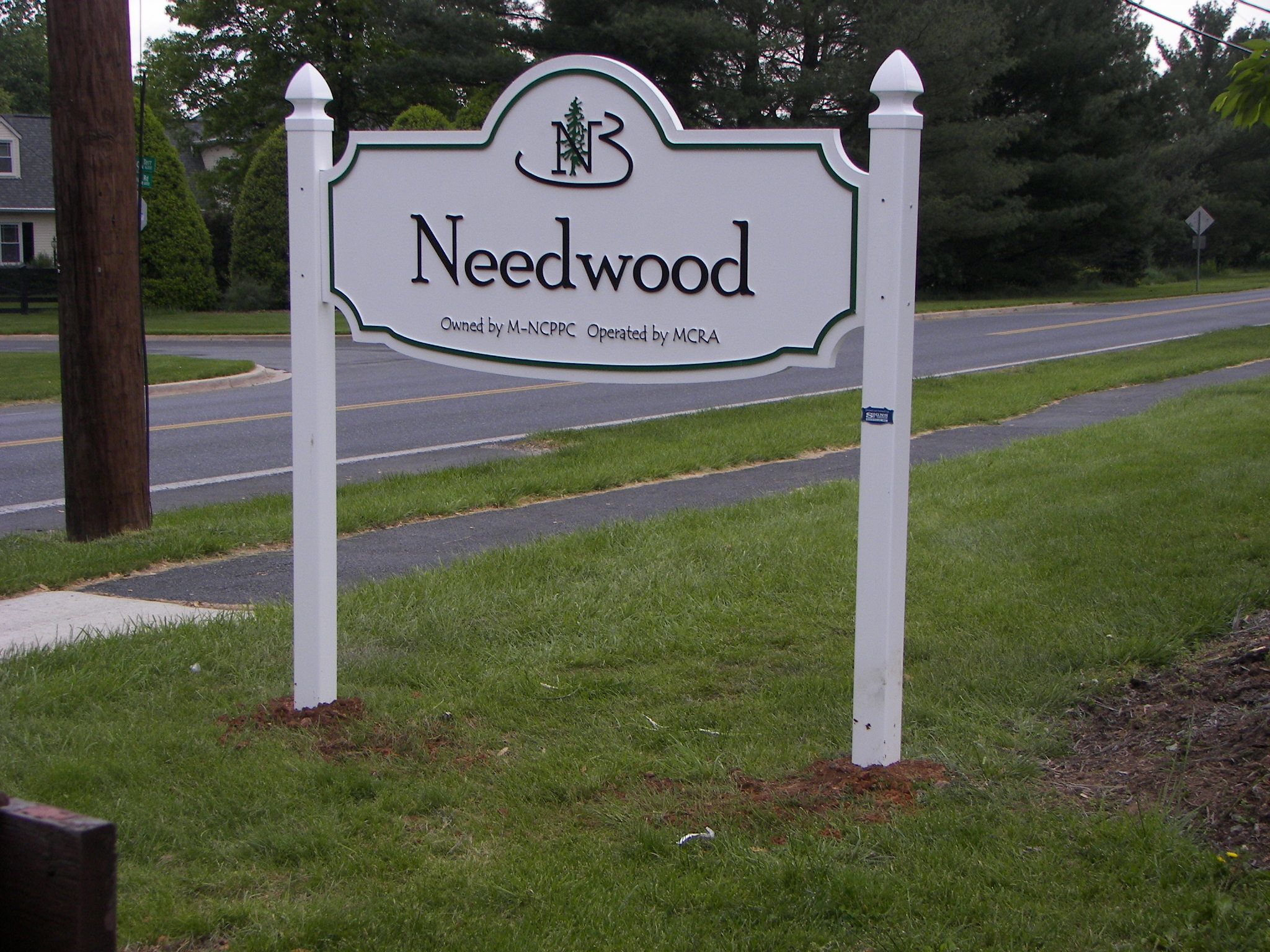 custom routed sign post and panel