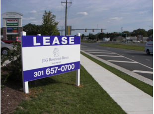 Lease Post and Panel Sign by Road
