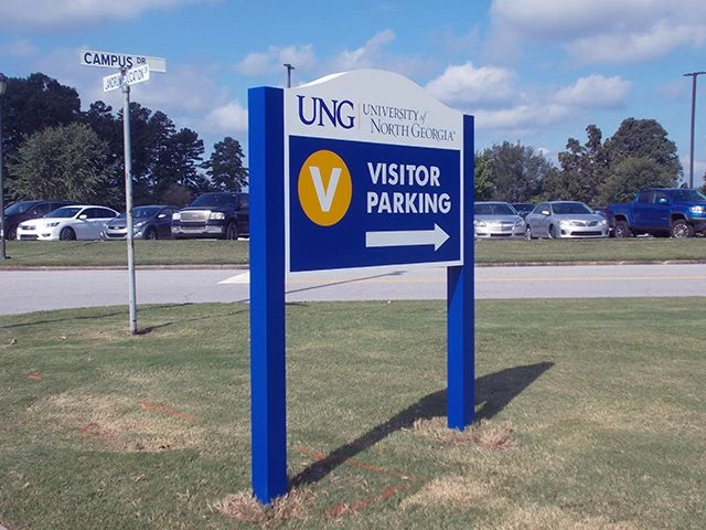 Blue Post and Panel Directional Sign for University