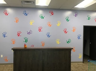 Colorful Wall Graphic of Handprints