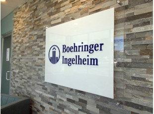 Interior Reception Acrylic Sign with Standoffs on Stone Background