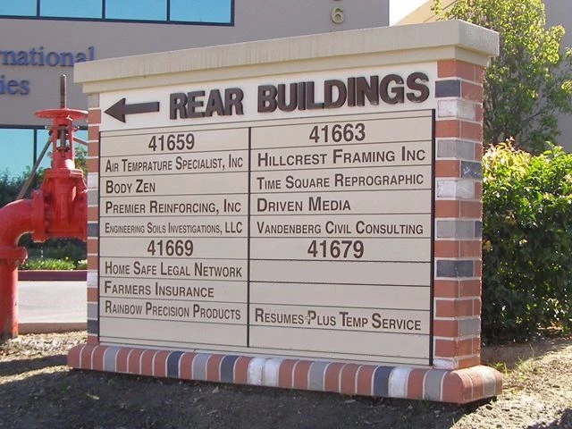 Monument Sign with Directory and Rear Buildings