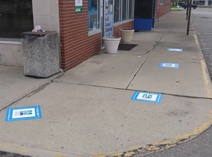 Social Distancing Floor Graphics for Credit Union Exterior