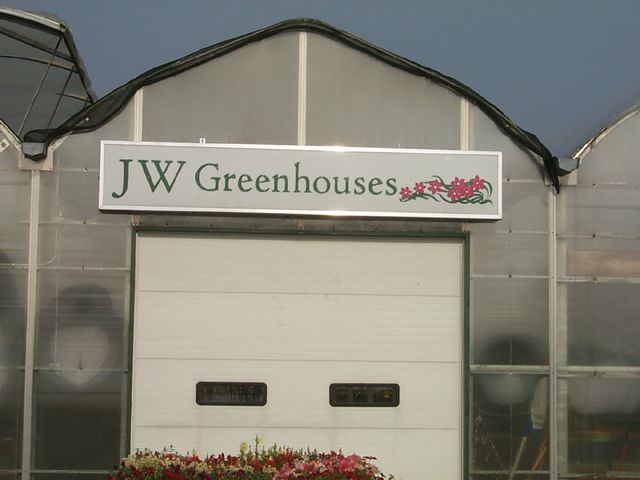 Cut vinyl on poly-carbonate in an illuminated light box cabinet