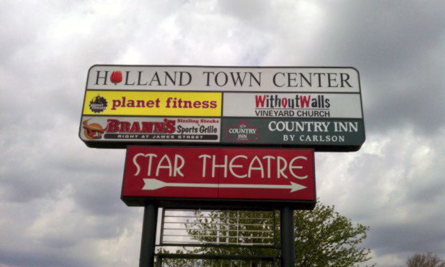 Cut vinyl and digitally printed on vinyl mounted on polycarbonate.