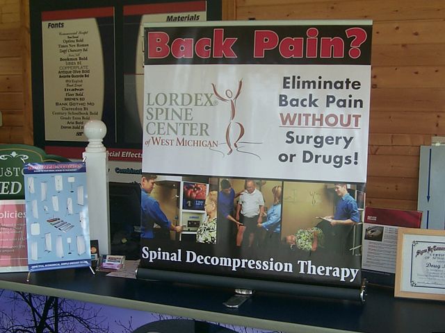 Digital printed banner attached in a table top banner stand