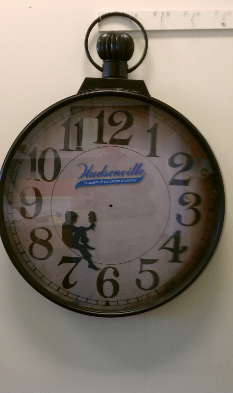 Digital printed vinyl applied in a clock frame