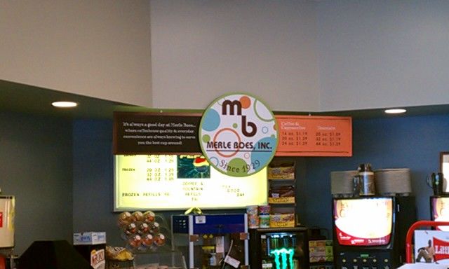 Digital printed vinyl with lamination applied on gatorfoam hung from ceiling