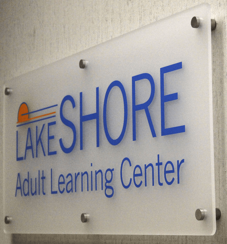 Frosted acrylic, cut vinyl, with stand-offs