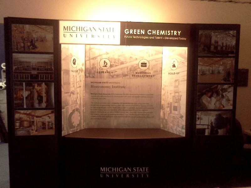 Hero 17 fabric with 22mil plastic attached with Velcro. Counter top with lit header.