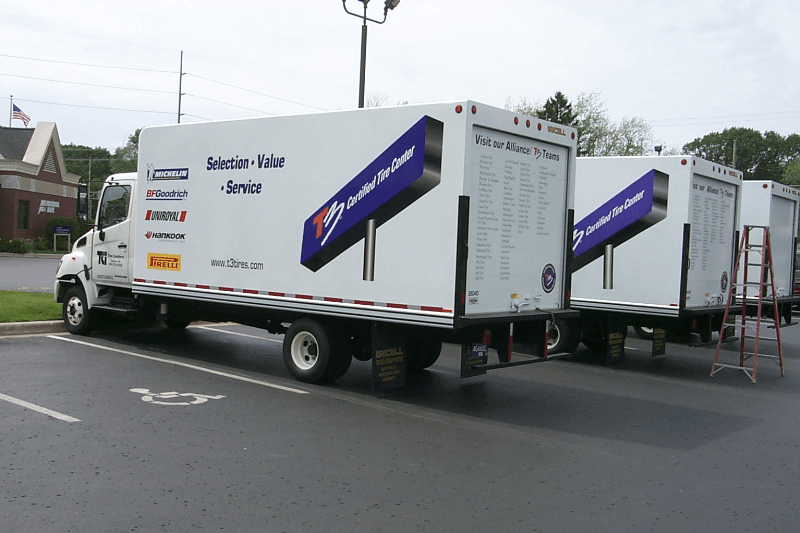 Digital printed vinyl with lamination. We did 10 of these, 2 sides and back.