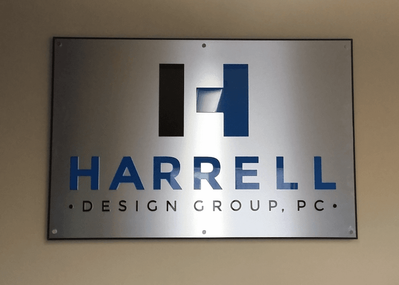 Acrylic letters on 4'x6' brushd silver backing