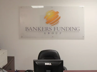 Reverse Printed Clear Acrylic with Silver Standoffs for Bankers Funding Group