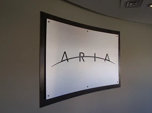 Brushed Silver Layered Lobby Logo for Aria by Rockville, MD