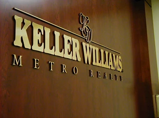 Black Acrylic with Brushed Gold Face Dimensional Lettering for Keller Williams