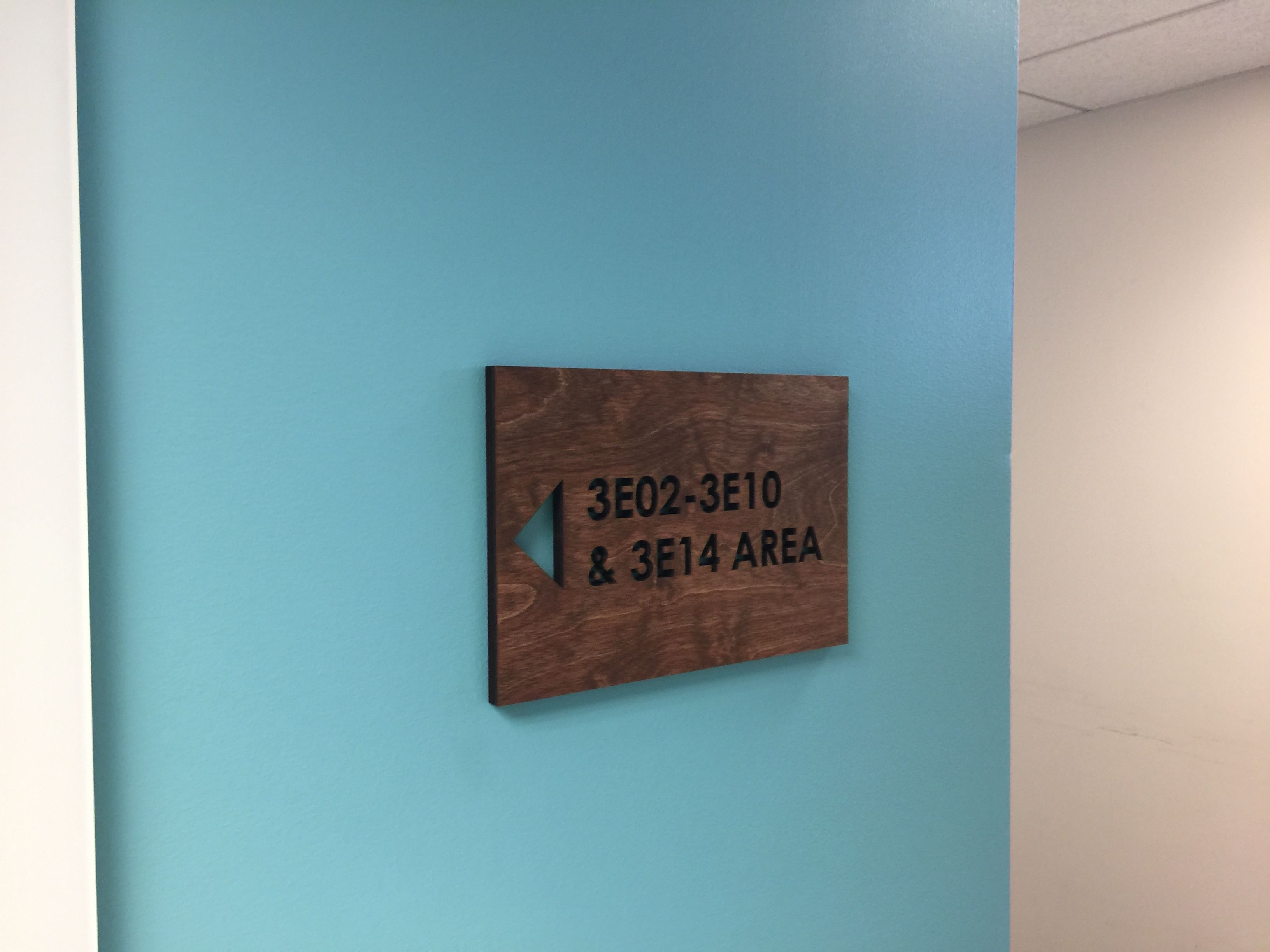 custom routed directional room number sign