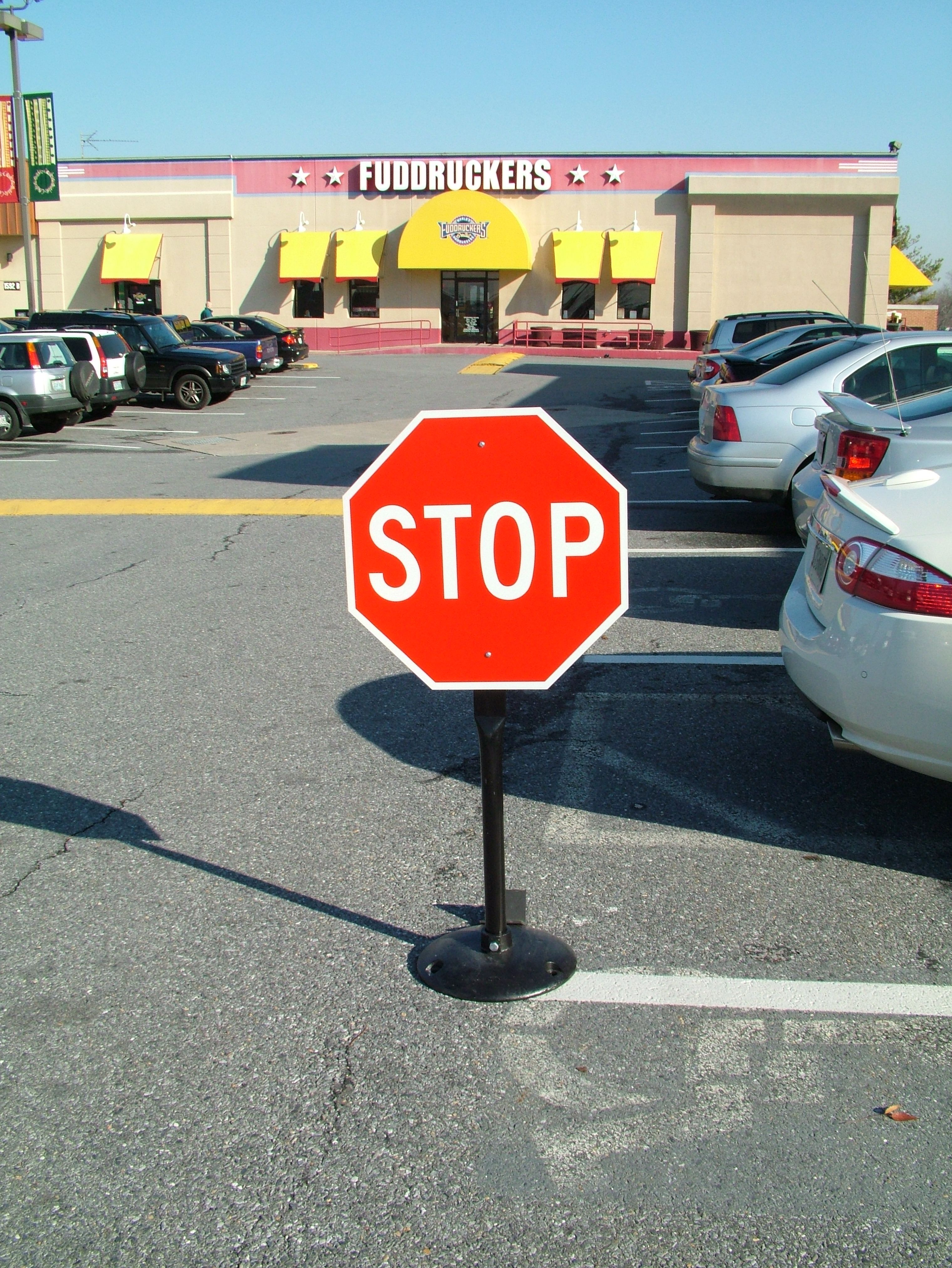 stop sign mounted on portable stand