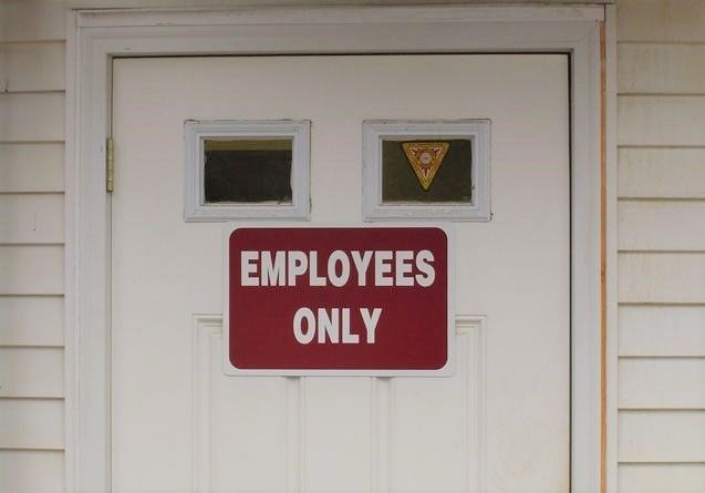 employees only door mounted sign