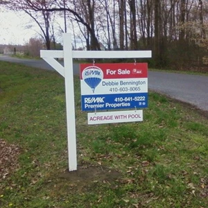 Remax Yard Arm Real Estate Sign