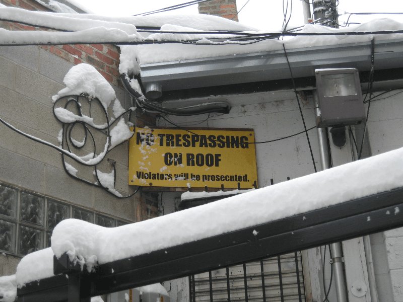 Black vinyl on Yellow Corrugated