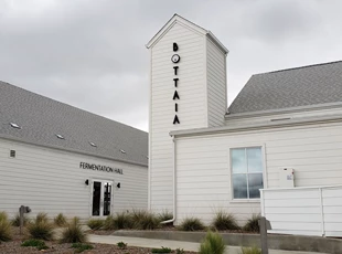 Black Non-Illuminated Dimensional Letters signage on white building, BOTTAIA Winery, Temecula Wine Country