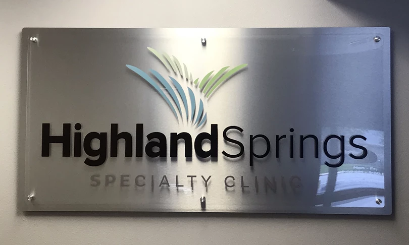 Acrylic and Brushed aluminum lobby sign with standoffs