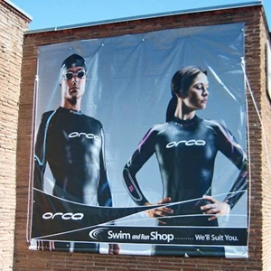 A large format banner at the Swim and Run Shop in downtown Boise