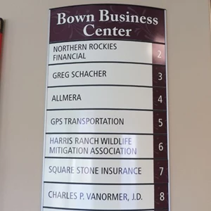 Directory sign with interchangeable slats for each office name