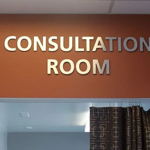 Interior dimensional acrylic lettering with metal faces