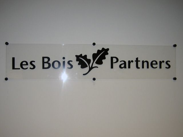 Make your logo stand out with vinyl lettering on an acrylic backing