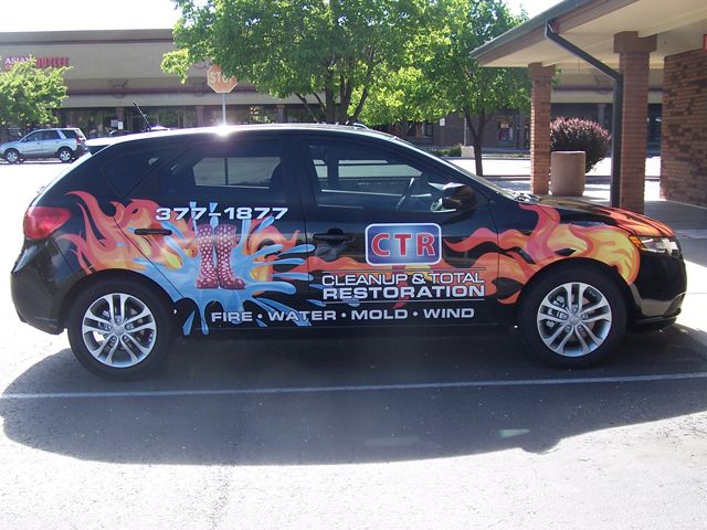 Partial wraps on a black vehicle make a bold statement