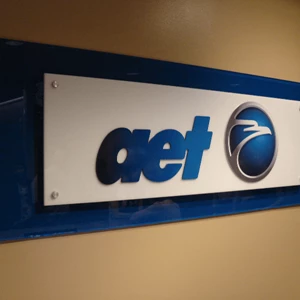 Lobby sign using layered acrylic with dimensional logo