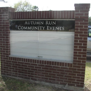 Reader board in front of HOA with changeable letters for messages.