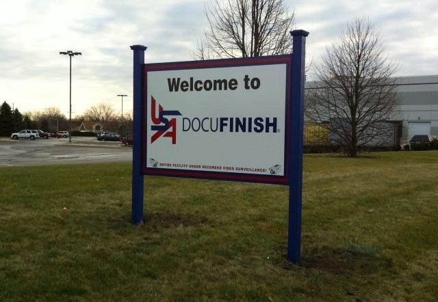 Post and panel business sign in Plainfield