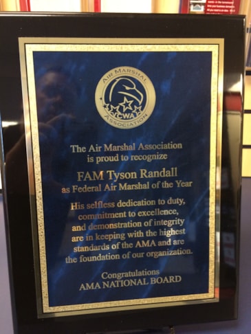 Wood piano finish plaque with engraved plate