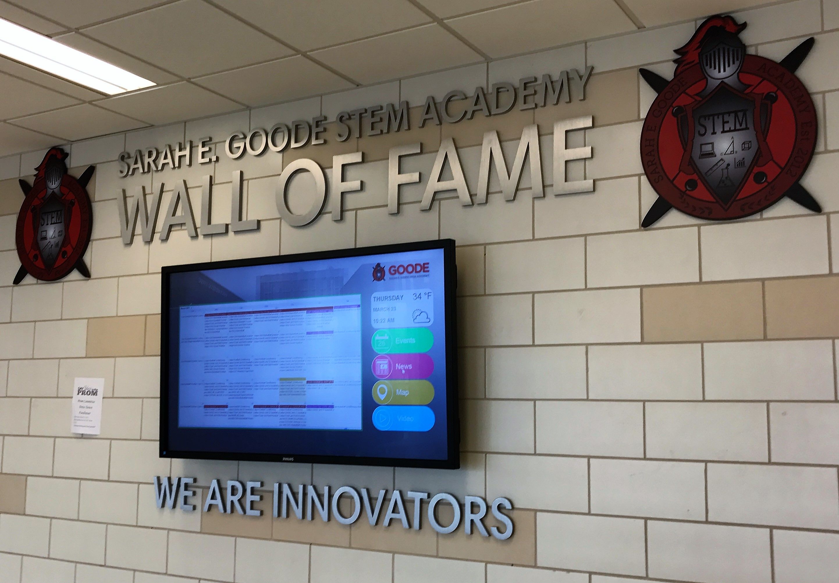 Brushed Aluminum letters stud mounted in wall