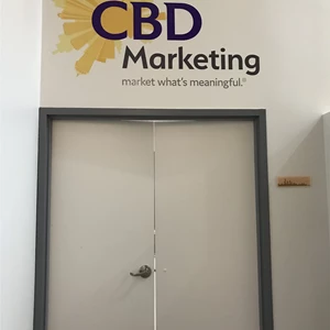 Custom logo cut to shape wall graphic at CBD Marketing in the  Chicago Loop