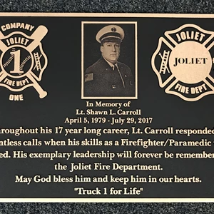 Large bronze dedication plaque for Lt Shawn Carroll from the Joliet Fire Department