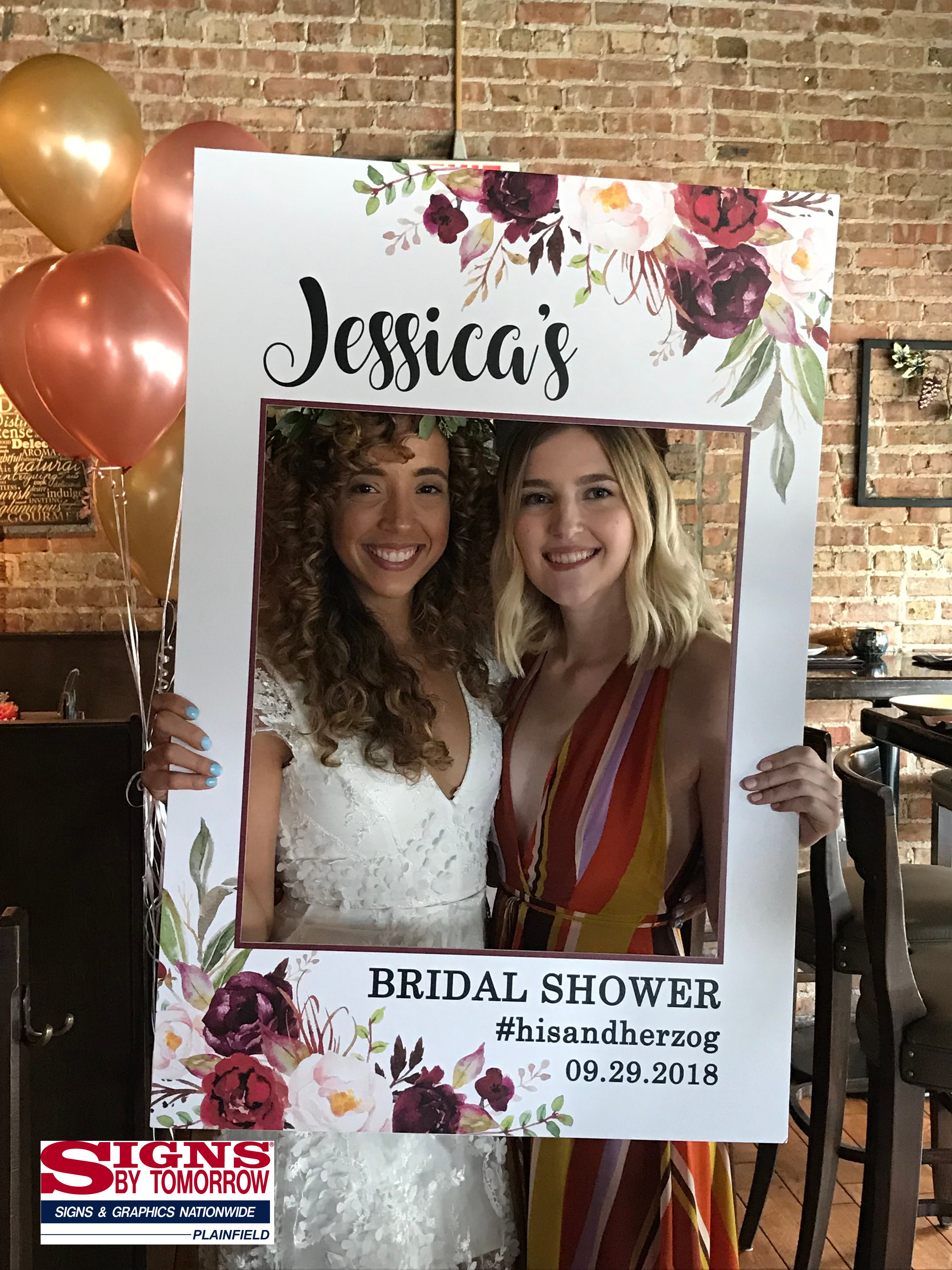 Beautiful ladies in a custom wedding frame for instagram pictures