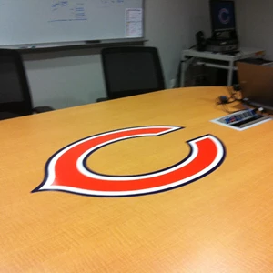 Custom 3M printed Chicago Bears Logo applied on a conference table at Halas Hall.