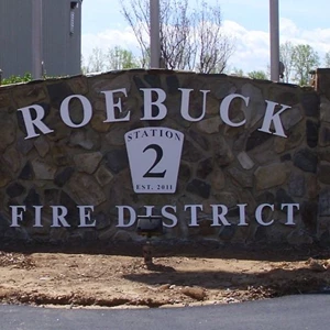 Roebuck Fire Department: Dimensional letters and polymetal logo on rock monument