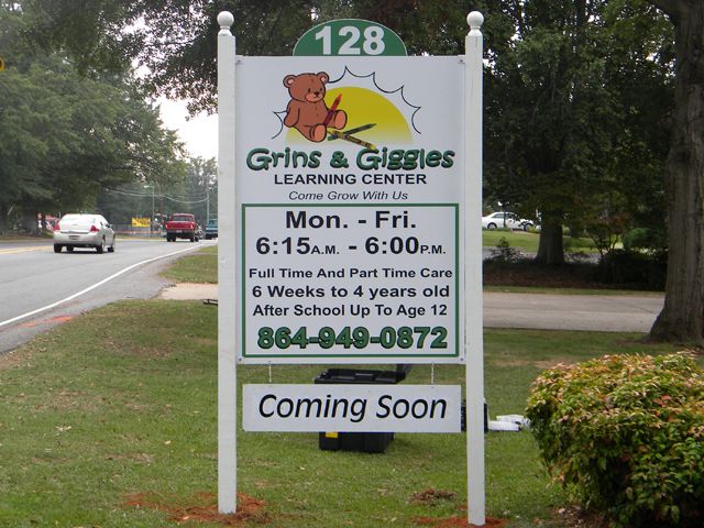 Grins & Giggles, Poly-Metal sign attached to wood posts, and post toppers