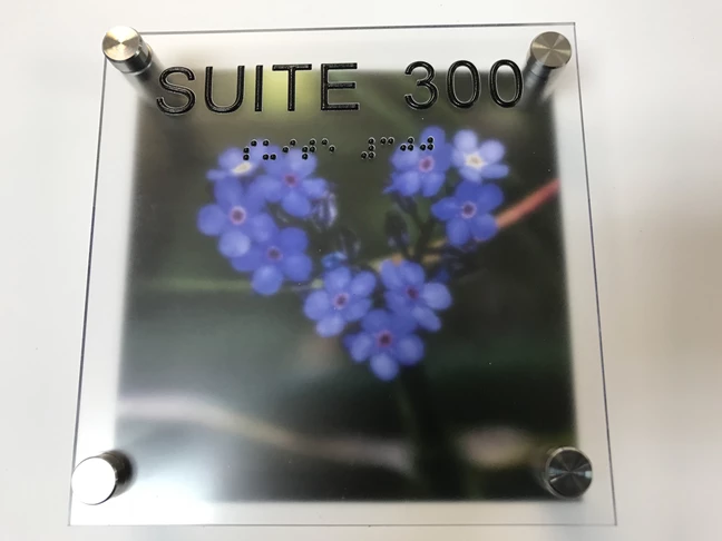 Custom Made ADA signs - With offset standoffs on multiple layers and and photographic quality printed backdrop - just about any photo will work for this process 