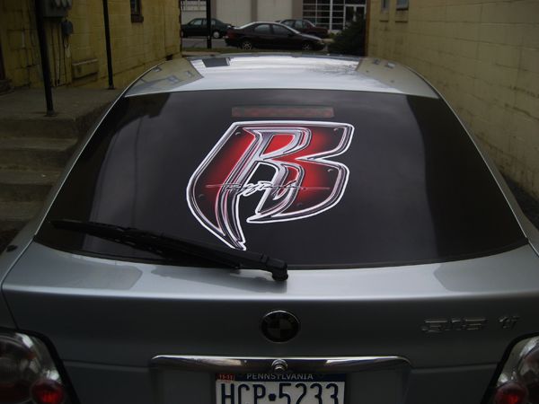 Decal Applied to Tinted Window Custom Logo