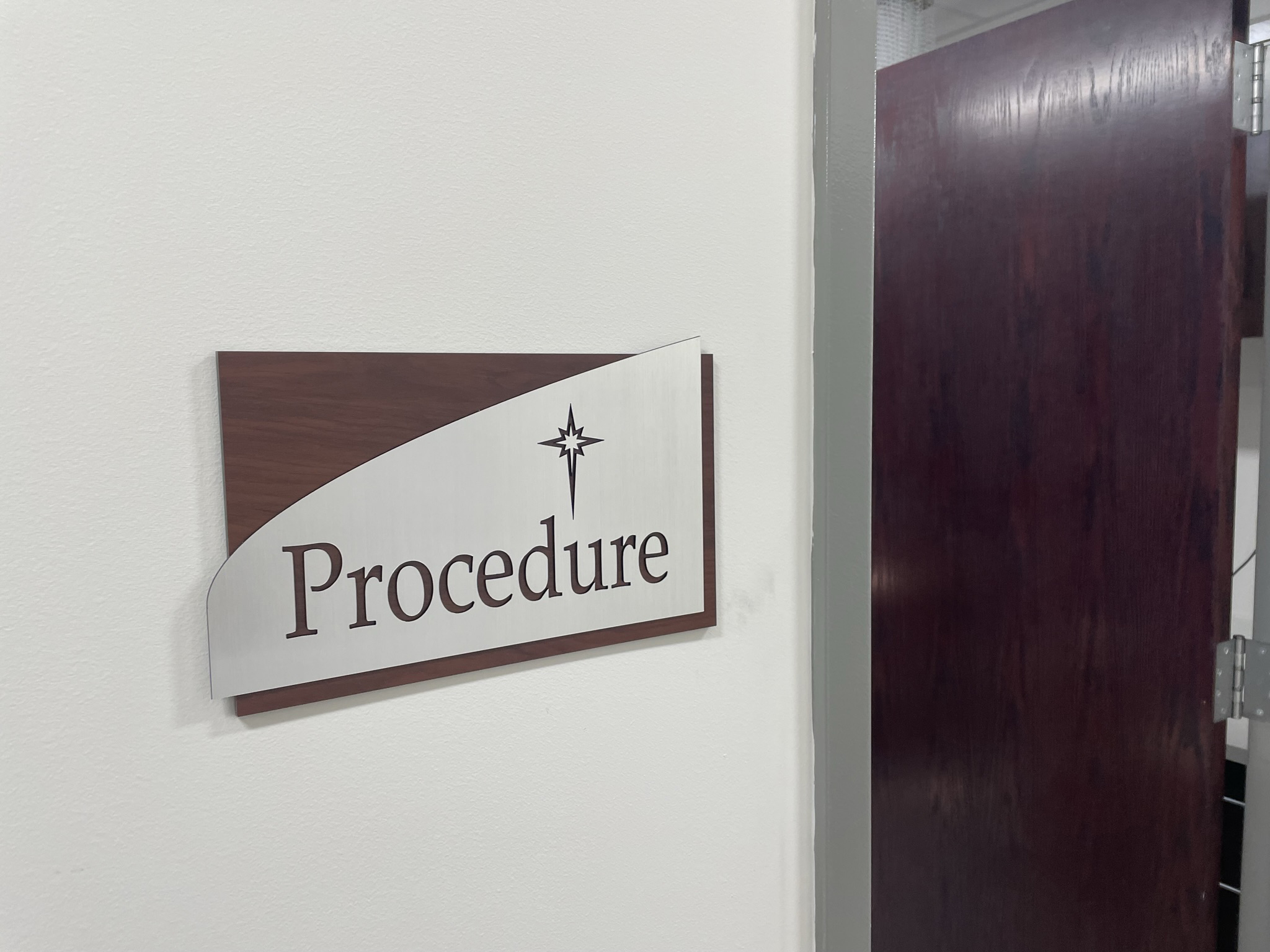 A dimensional side profile showing the layered thickness of our architectural corporate signage, featuring cut-out custom lettering and architectural curves.ADA Signage & Compliance – Allentown Lehigh Valley PA