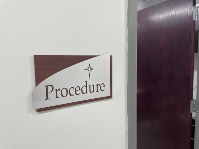 A dimensional side profile showing the layered thickness of our architectural corporate signage, featuring cut-out custom lettering and architectural curves.ADA Signage & Compliance – Allentown Lehigh Valley PA