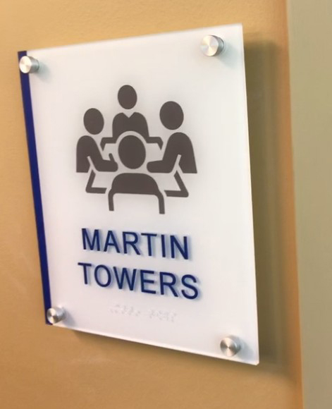 Custom architectural boardroom signage utilizing premium architectural standoffs, sub-surface color bars, and grade 2 dome Braille beads. ADA Signage & Compliance – Allentown Lehigh Valley PA