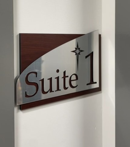 A dimensional side profile showing the layered thickness of our architectural corporate signage, featuring cut-out custom lettering and architectural curves.ADA Signage & Compliance – Allentown Lehigh Valley PA