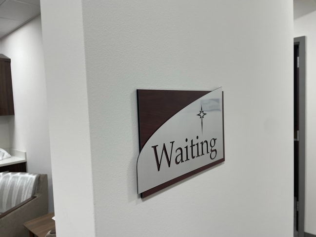 A dimensional side profile showing the layered thickness of our architectural corporate signage, featuring cut-out custom lettering and architectural curves. ADA Signage & Compliance – Allentown Lehigh Valley PA