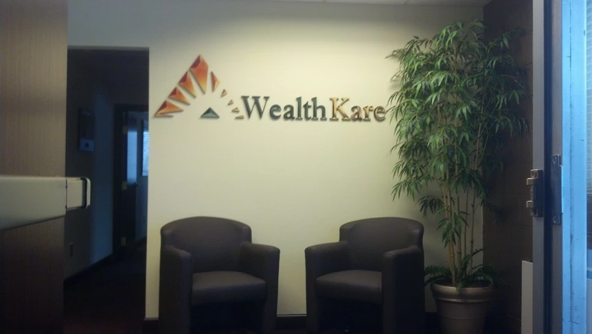 Wealth Kare Wall Logo
